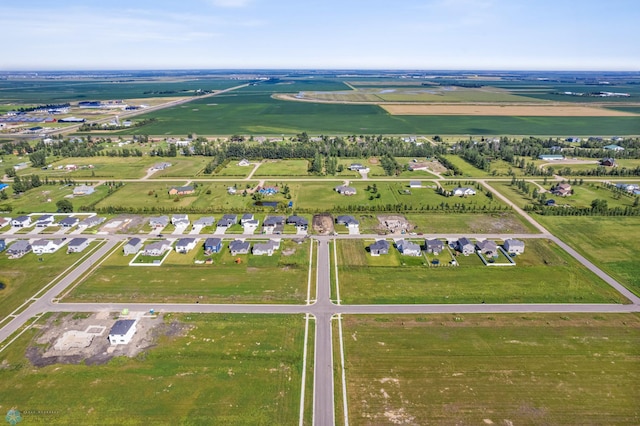 bird's eye view with a rural view and a water view