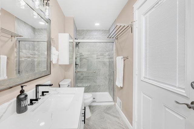 4756 Kildare Rd, Mound, MN 55364 - bathroom featuring toilet, vanity, a stall shower, marble finish floors, and baseboards