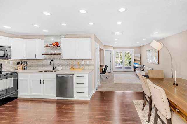 4756 Kildare Rd, Mound, MN 55364 - kitchen with appliances with stainless steel finishes, a sink, light countertops, backsplash, and recessed lighting