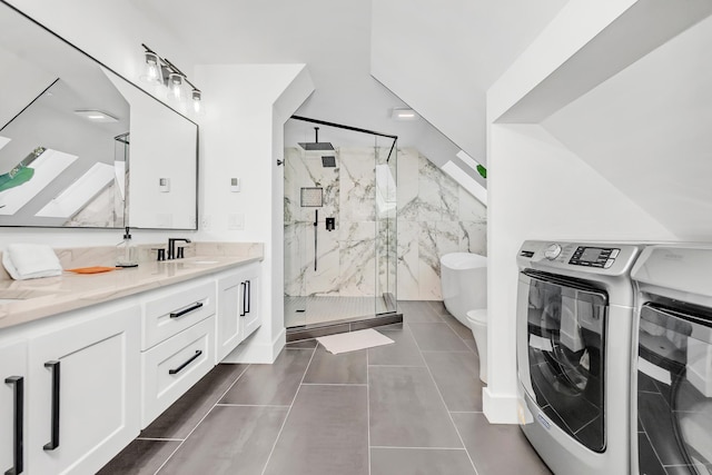 4756 Kildare Rd, Mound, MN 55364 - bathroom with washing machine and dryer, a marble finish shower, vanity, toilet, and tile patterned flooring