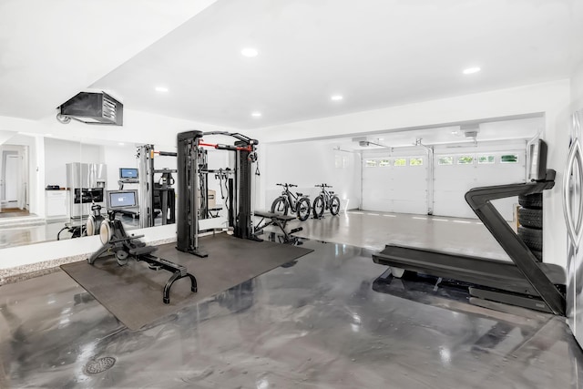 workout area featuring concrete flooring