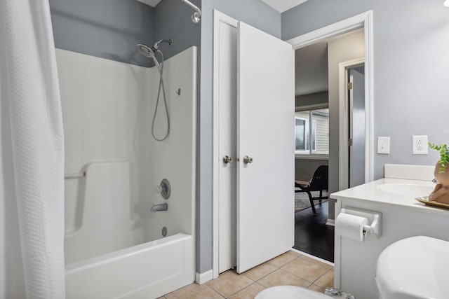 full bathroom with tile patterned floors, vanity, shower / bath combo, and toilet