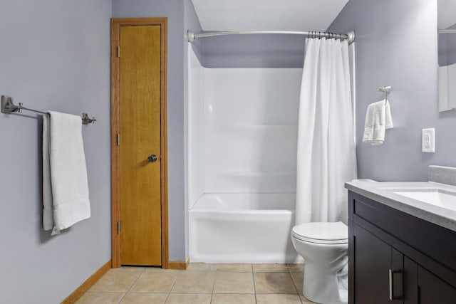 full bathroom featuring toilet, vanity, tile patterned floors, and shower / bathtub combination with curtain