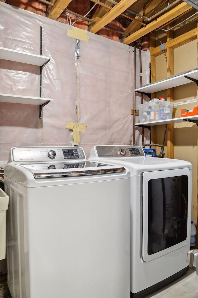 laundry area featuring washing machine and dryer