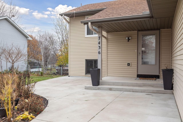 doorway to property featuring a patio area