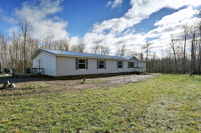 exterior space with a front lawn