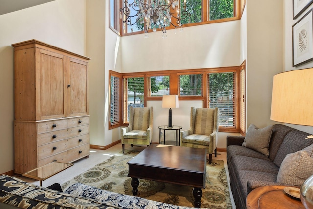 5006 Sheridan Ave S, Minneapolis, MN 55410 - living area with a high ceiling, a chandelier, and baseboards