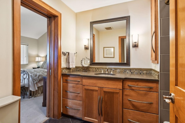 5006 Sheridan Ave S, Minneapolis, MN 55410 - ensuite bathroom with vanity and tasteful backsplash