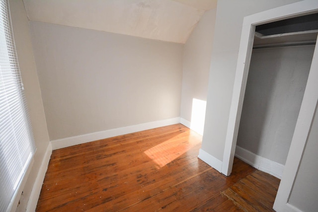 107 3rd Ave SW, Austin, MN 55912 - unfurnished bedroom with a closet and dark wood-type flooring