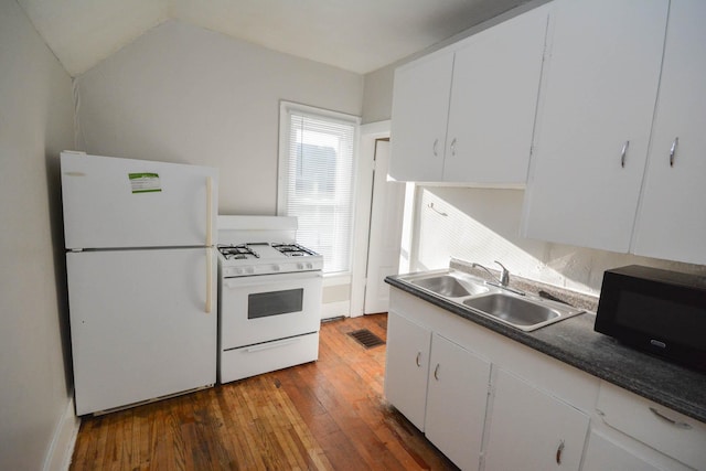 107 3rd Ave SW, Austin, MN 55912 - kitchen with white appliances, white cabinets, dark wood-type flooring, and sink