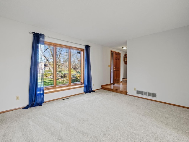 unfurnished room with carpet floors