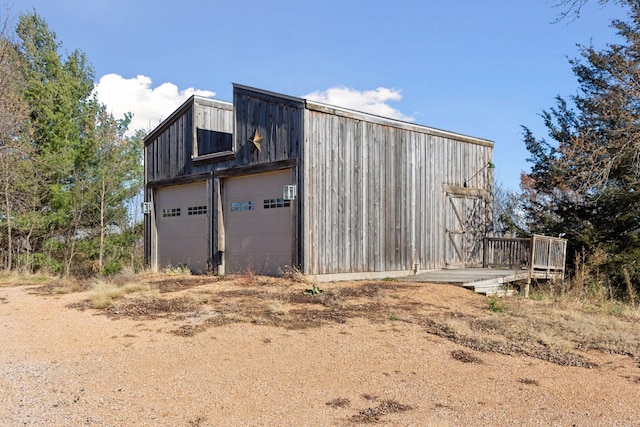 view of outbuilding featuring a garage