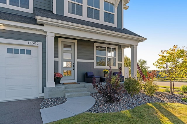 doorway to property featuring a garage