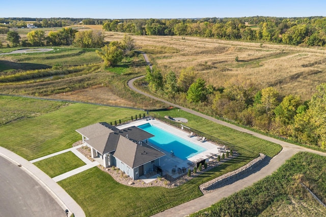 birds eye view of property with a rural view