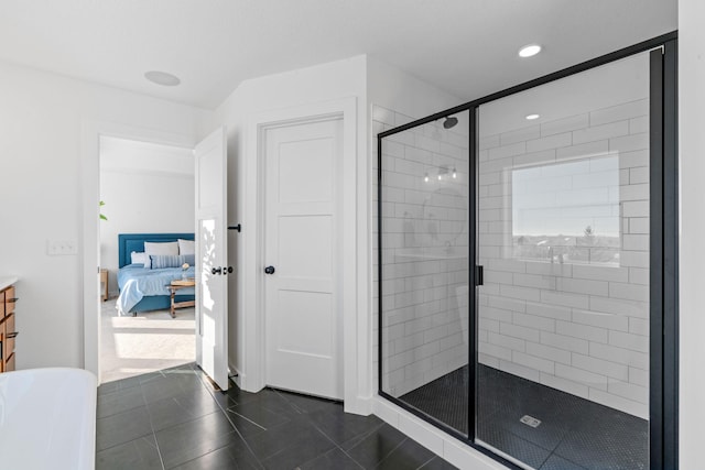 bathroom featuring tile patterned floors and an enclosed shower