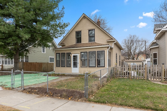 view of front of house with a front lawn