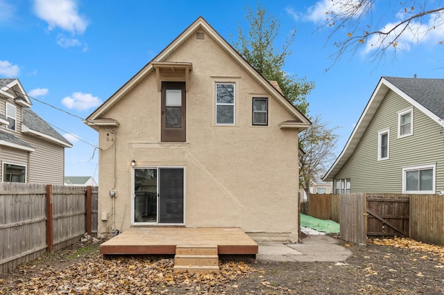 rear view of house with a deck