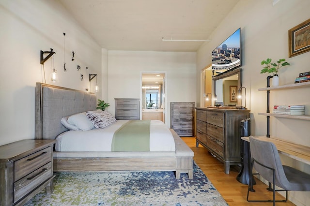 bedroom with light wood-type flooring