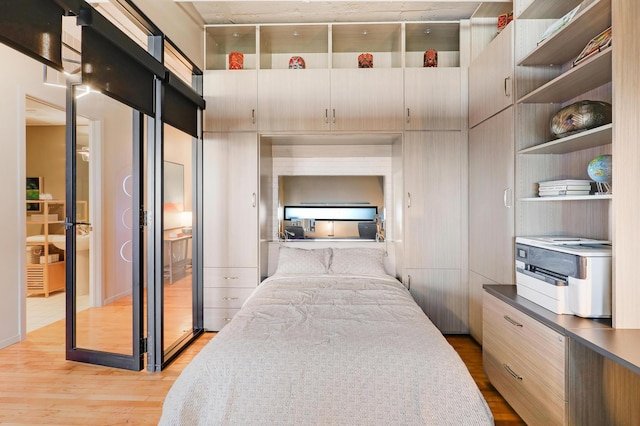 bedroom featuring light hardwood / wood-style floors