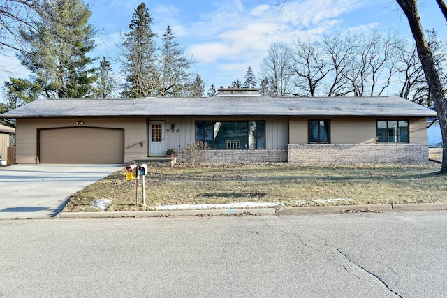 ranch-style house featuring a garage