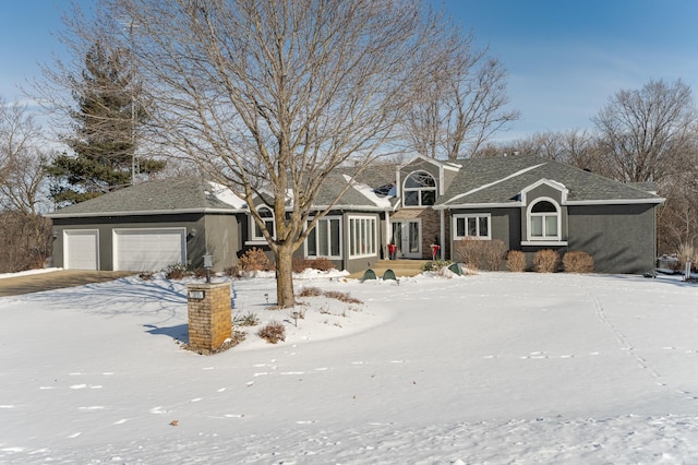 view of front of property featuring a garage and stucco siding