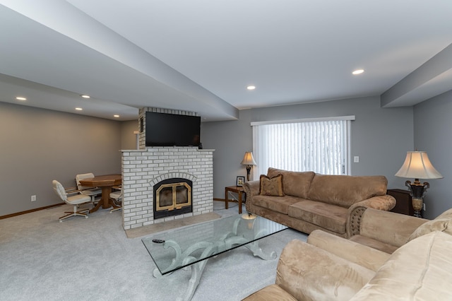 living area featuring carpet floors, a fireplace, baseboards, and recessed lighting