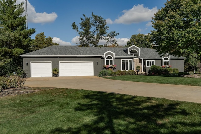 ranch-style house with an attached garage, driveway, a front lawn, and stucco siding