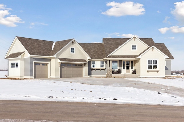 craftsman house featuring a garage and a porch