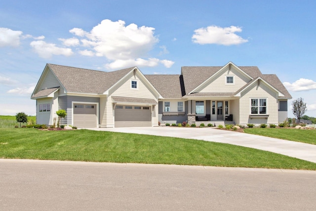 14320 47th St N, Stillwater, MN 55082 - view of front of property featuring driveway, a front yard, an attached garage, and covered porch