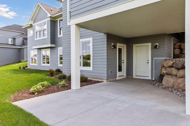 14320 47th St N, Stillwater, MN 55082 - doorway to property featuring a lawn and a patio