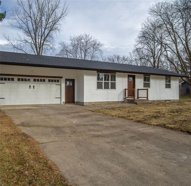 ranch-style home featuring a garage