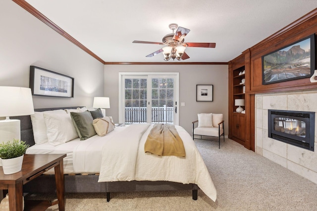 bedroom with access to exterior, carpet floors, and ceiling fan