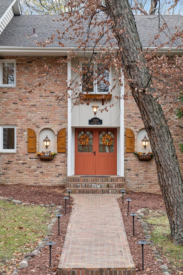 property entrance featuring french doors