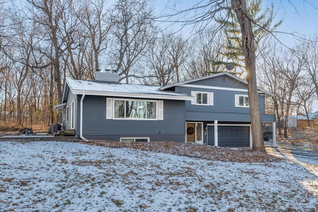 view of front of property featuring a garage