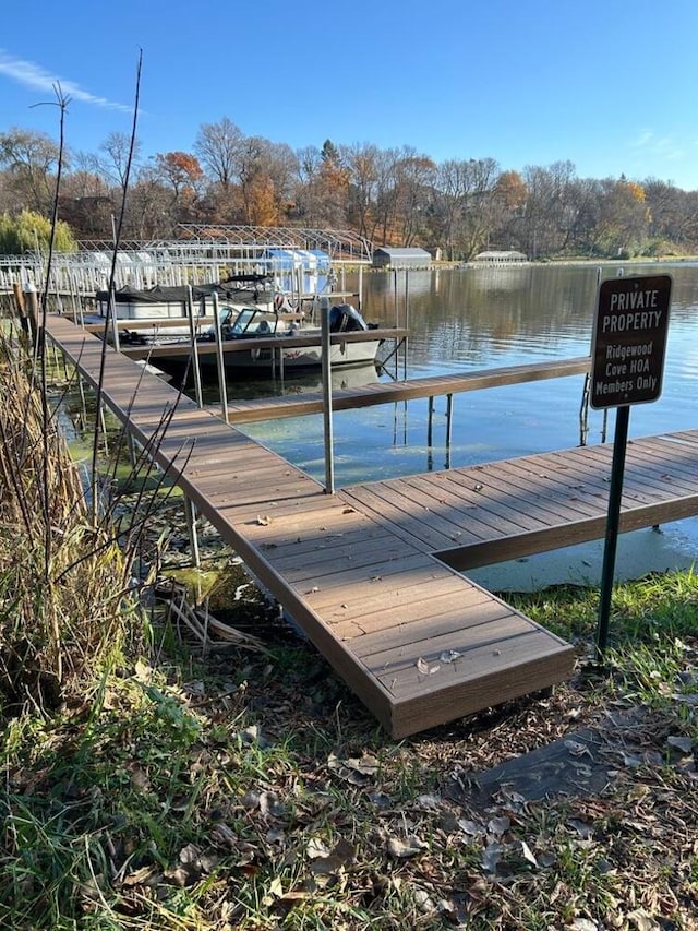 view of dock with a water view