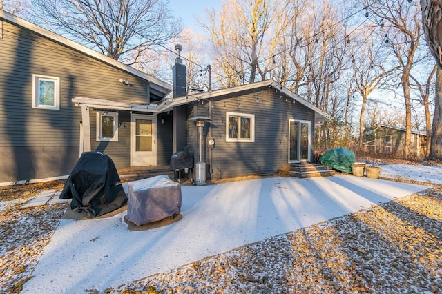 back of house with a patio area