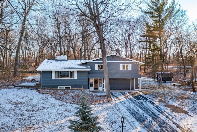 tri-level home featuring a garage