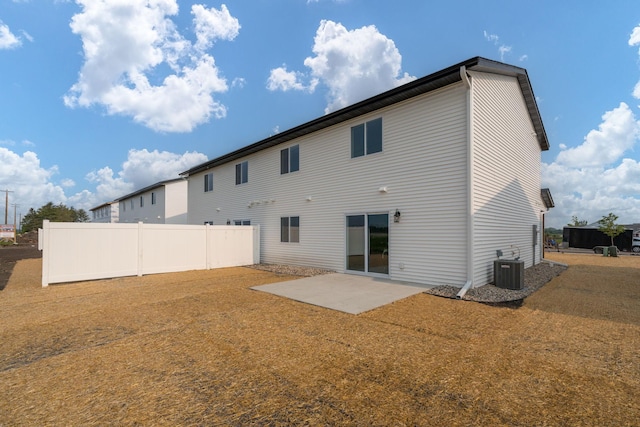 3104 Scotch Ln, Mankato, MN 56001 - rear view of house with a patio and central AC unit