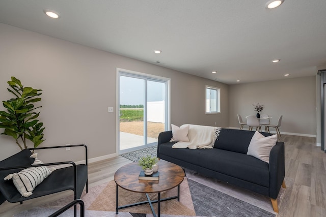 3104 Scotch Ln, Mankato, MN 56001 - living room with light wood finished floors, recessed lighting, and baseboards