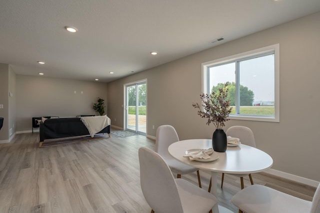 3104 Scotch Ln, Mankato, MN 56001 - dining room featuring baseboards, light wood-style floors, and recessed lighting