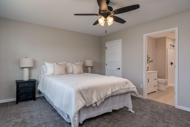 3104 Scotch Ln, Mankato, MN 56001 - bedroom featuring light carpet, baseboards, connected bathroom, and a ceiling fan