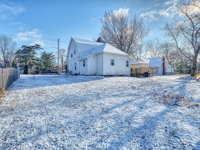 view of snow covered property