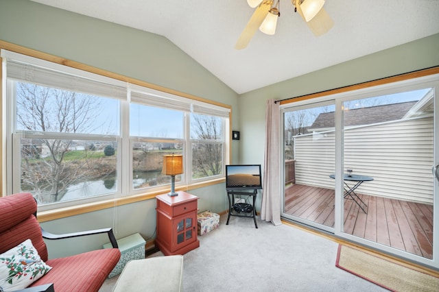 sunroom featuring vaulted ceiling and ceiling fan