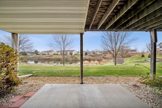 view of patio / terrace with a water view