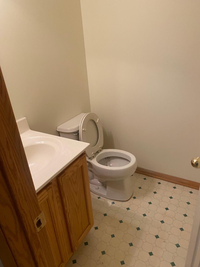 bathroom with vanity and toilet