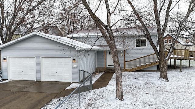 ranch-style home featuring a garage