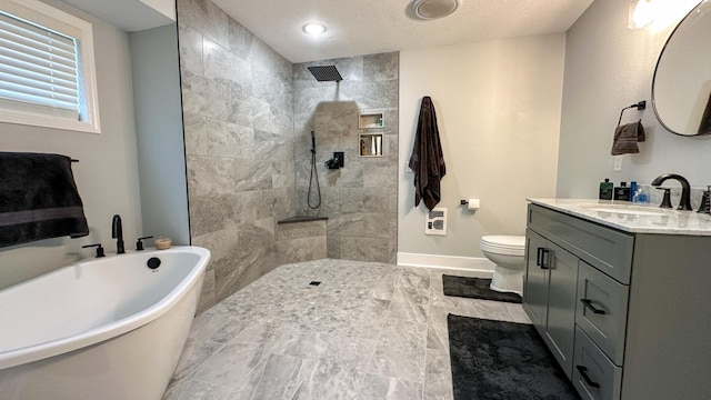 full bathroom featuring vanity, separate shower and tub, a textured ceiling, and toilet