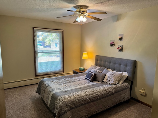 carpeted bedroom with a textured ceiling and ceiling fan