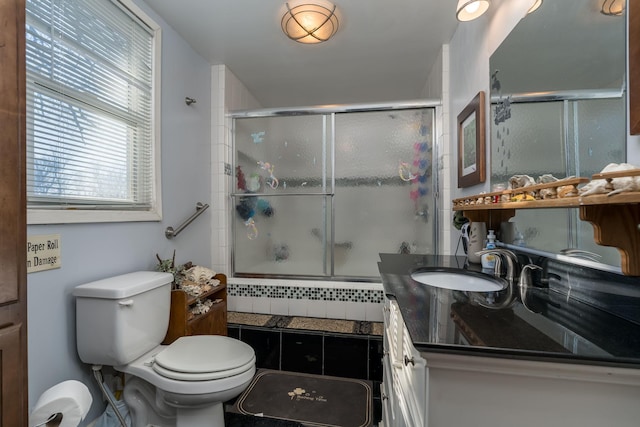 bathroom with radiator heating unit, toilet, and vanity