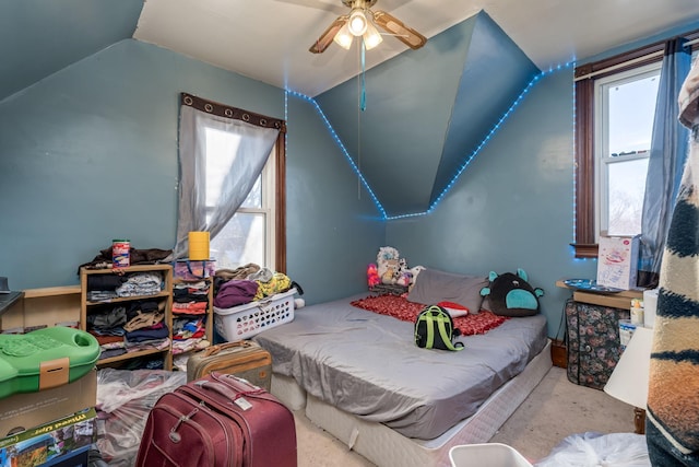 bedroom with ceiling fan and vaulted ceiling